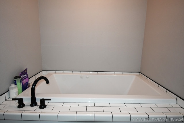 bathroom with a tub to relax in