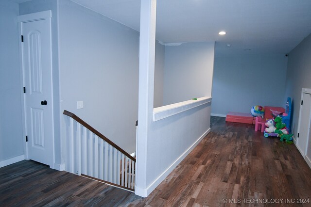 hall featuring dark hardwood / wood-style floors