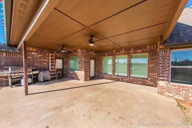 view of patio featuring grilling area and ceiling fan