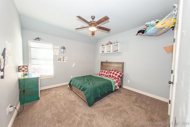 bedroom featuring ceiling fan and carpet floors