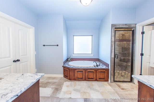 bathroom with vanity and plus walk in shower