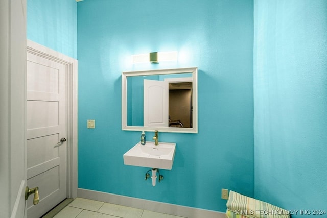 bathroom with tile patterned floors and sink