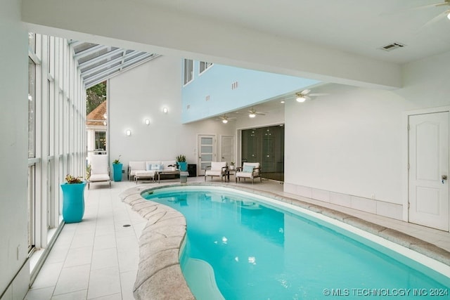 view of pool with ceiling fan