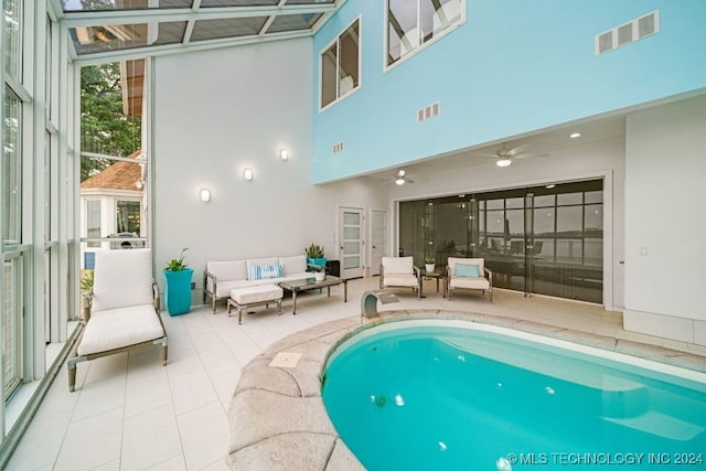 view of pool featuring ceiling fan