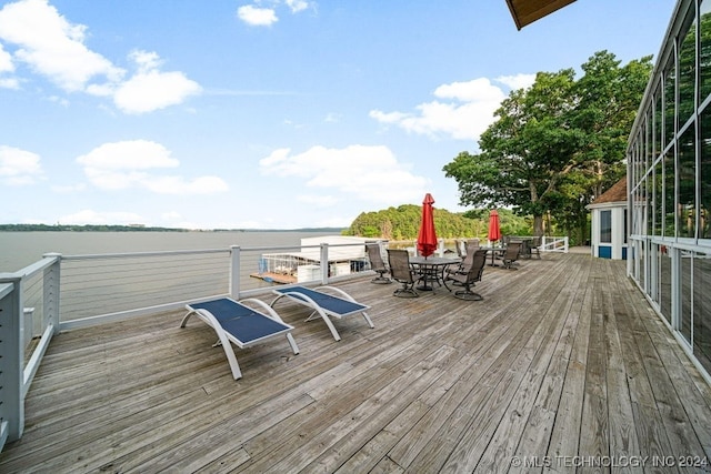 deck featuring a water view