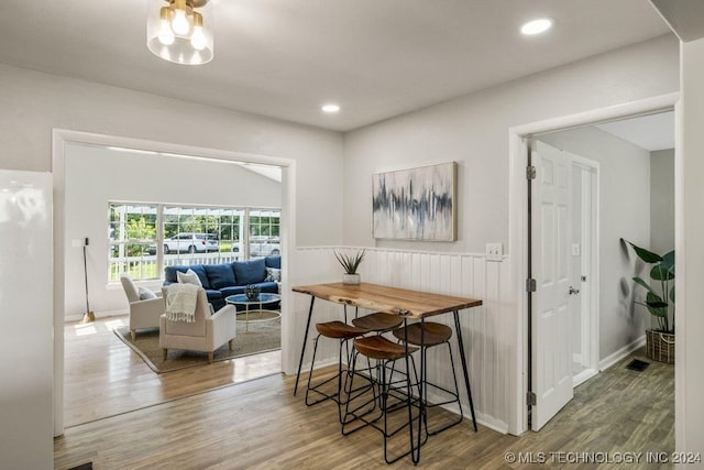 dining room with hardwood / wood-style floors