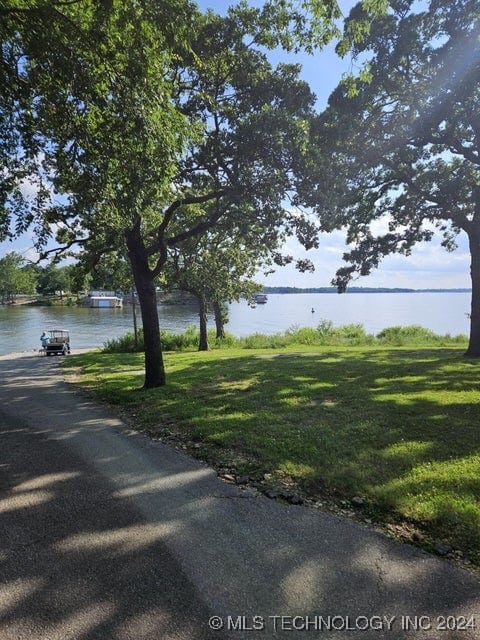 view of yard with a water view