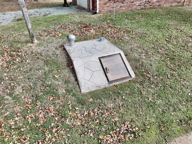 view of entry to storm shelter