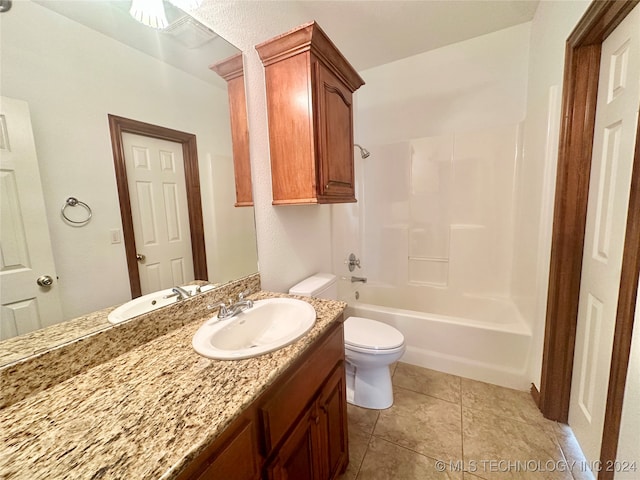 full bathroom featuring tile patterned flooring, vanity, toilet, and shower / bath combination