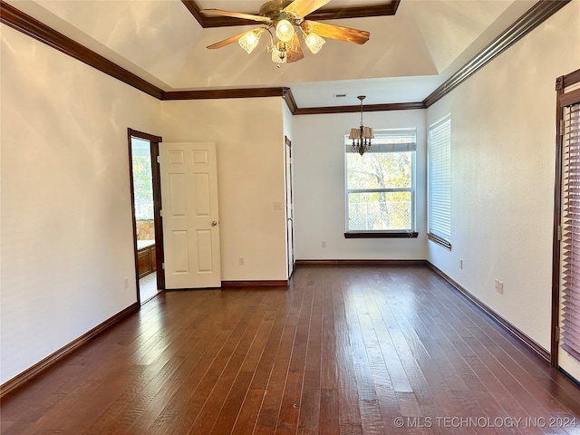 unfurnished room featuring ceiling fan with notable chandelier, dark hardwood / wood-style floors, and ornamental molding