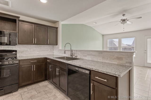 kitchen with sink, backsplash, kitchen peninsula, vaulted ceiling, and black appliances