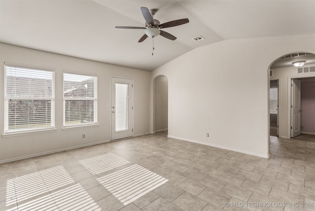 spare room featuring ceiling fan and lofted ceiling