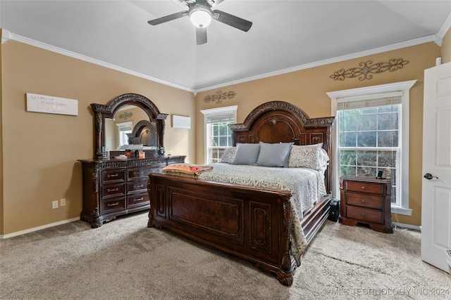 bedroom featuring ceiling fan, ornamental molding, light carpet, and lofted ceiling