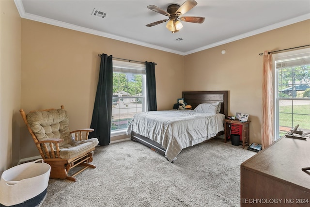 3103 Callaway Dr, Claremore, OK 74019 - bedroom with carpet, multiple windows, ornamental molding, and a ceiling fan