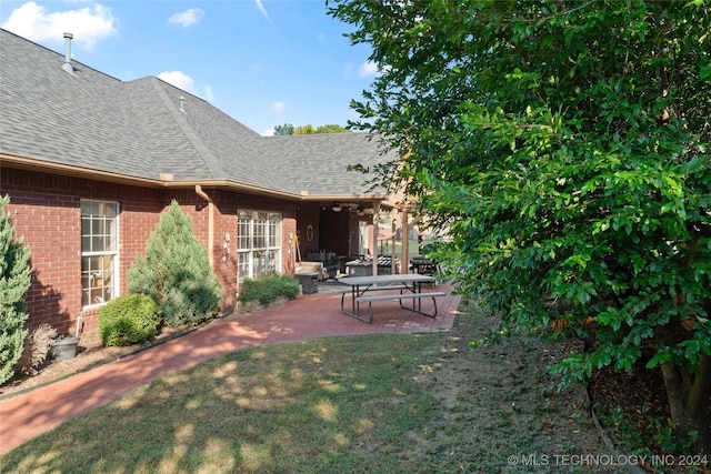 3103 Callaway Dr, Claremore, OK 74019 - view of grassy yard with a patio