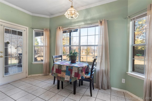 dining space featuring crown molding, light tile patterned flooring, and a notable chandelier