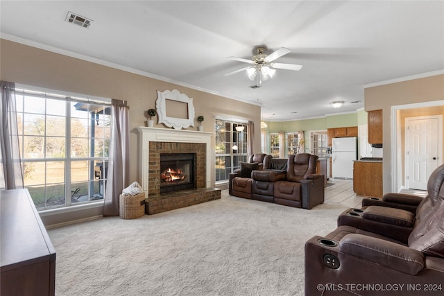 living room with light carpet, ceiling fan, and crown molding