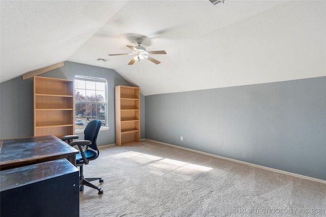 carpeted home office featuring ceiling fan and lofted ceiling