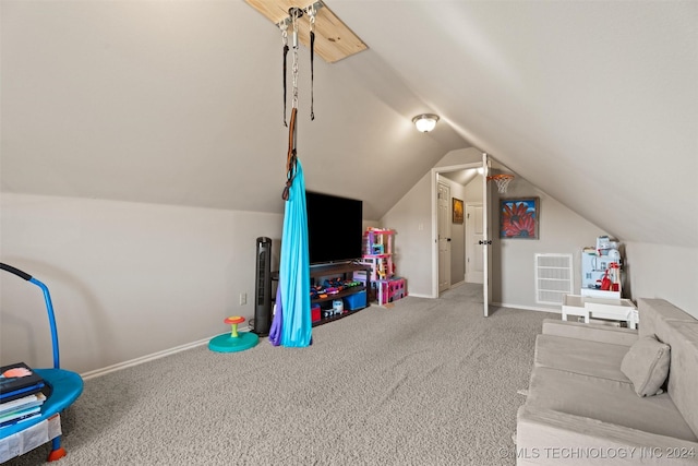 game room with carpet floors and vaulted ceiling