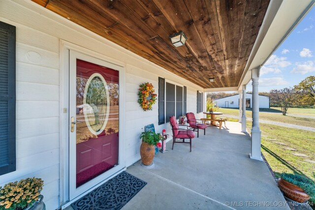 entrance to property with a porch