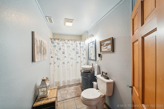 bathroom with vanity, a shower with curtain, and toilet