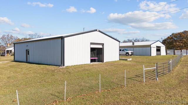 view of outdoor structure with a yard