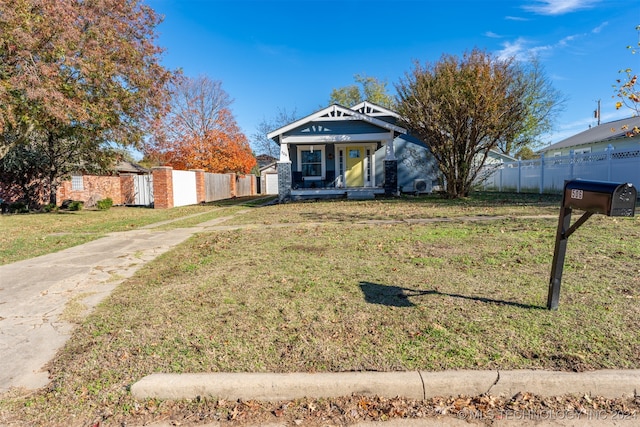 view of front of home featuring a front lawn