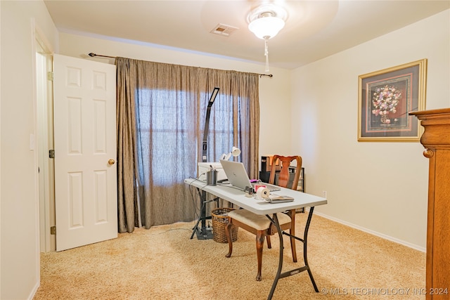 office space with light colored carpet