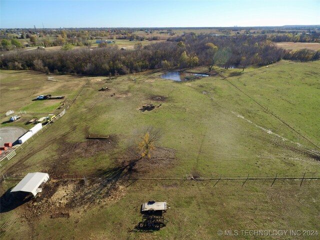 bird's eye view featuring a rural view and a water view