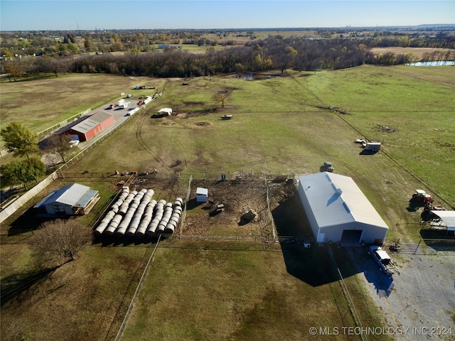 birds eye view of property featuring a rural view