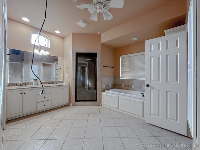 bathroom featuring tile patterned floors, ceiling fan, plus walk in shower, and vanity