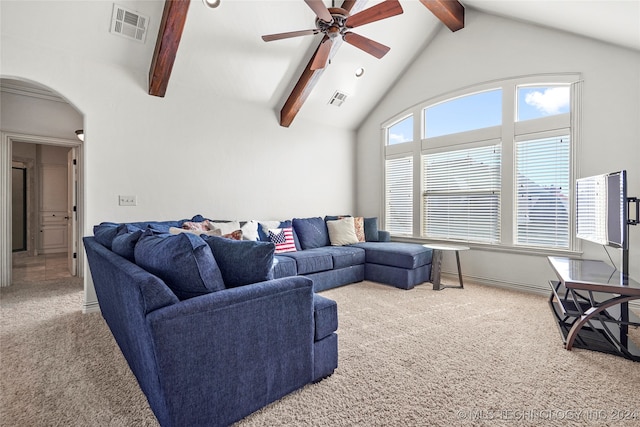 carpeted living room featuring beam ceiling, ceiling fan, and high vaulted ceiling