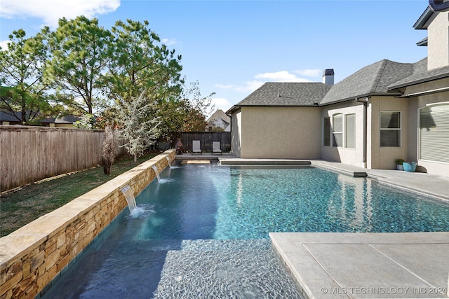 view of pool with pool water feature