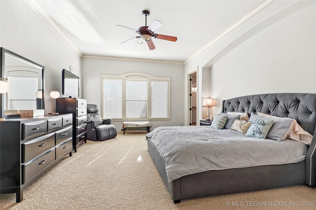 bedroom featuring ceiling fan, light colored carpet, and ornamental molding