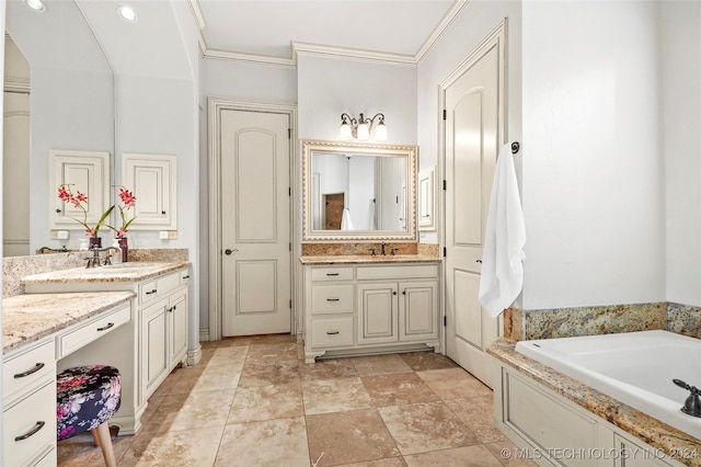 bathroom featuring vanity, ornamental molding, and a washtub