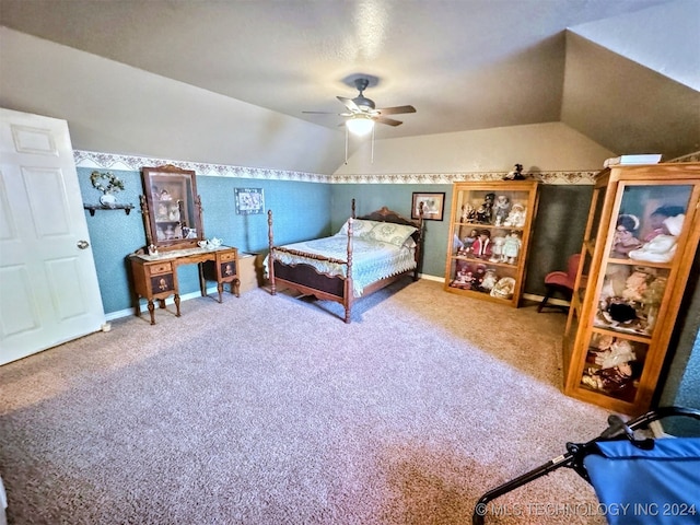 bedroom featuring carpet floors, vaulted ceiling, and ceiling fan