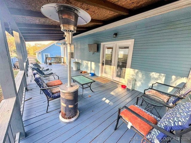 wooden deck with ceiling fan