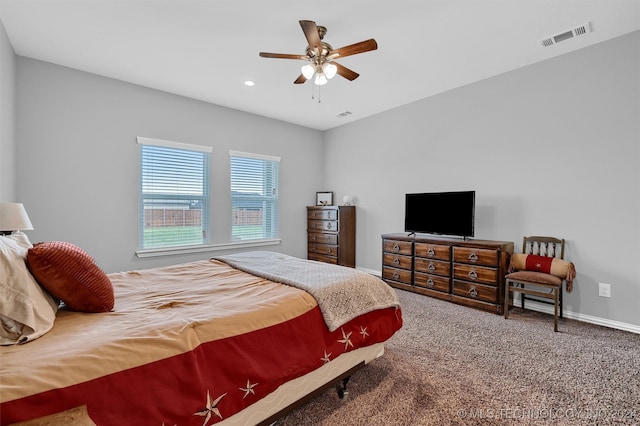 carpeted bedroom with ceiling fan