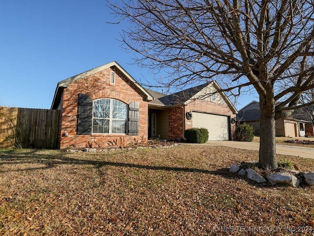 ranch-style home featuring a garage