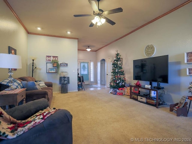 living room with carpet floors, ceiling fan, and ornamental molding