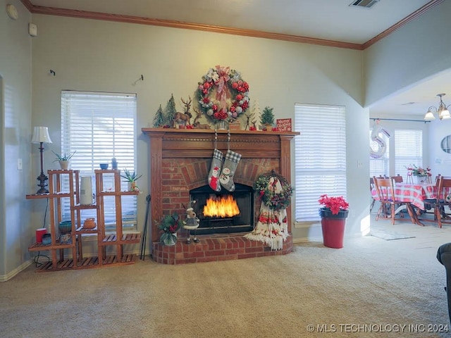 living room featuring carpet, a healthy amount of sunlight, a fireplace, and ornamental molding