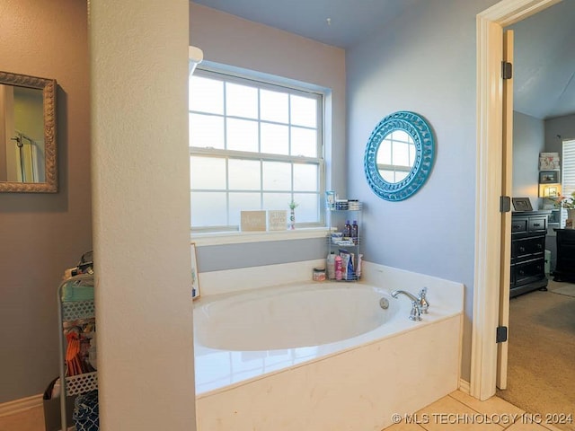 bathroom featuring a bathing tub and tile patterned floors