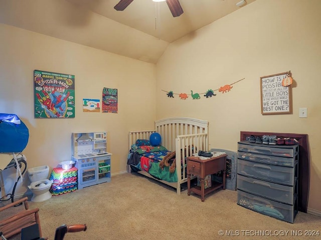 carpeted bedroom with ceiling fan and lofted ceiling