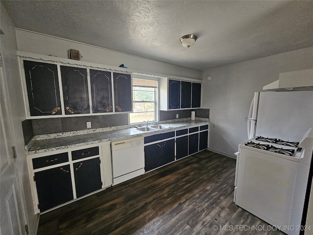 kitchen featuring a textured ceiling, white appliances, extractor fan, dark wood-type flooring, and sink