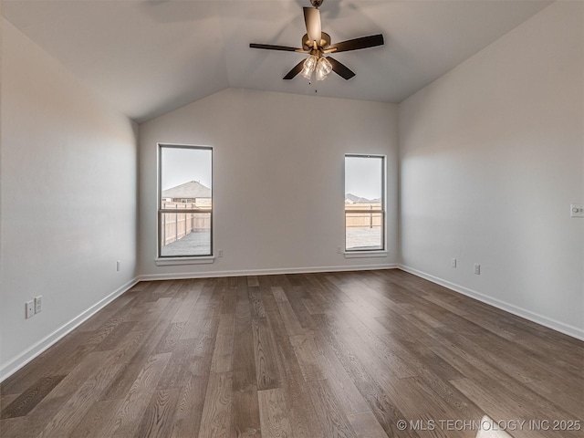 unfurnished room with wood-type flooring, ceiling fan, and vaulted ceiling