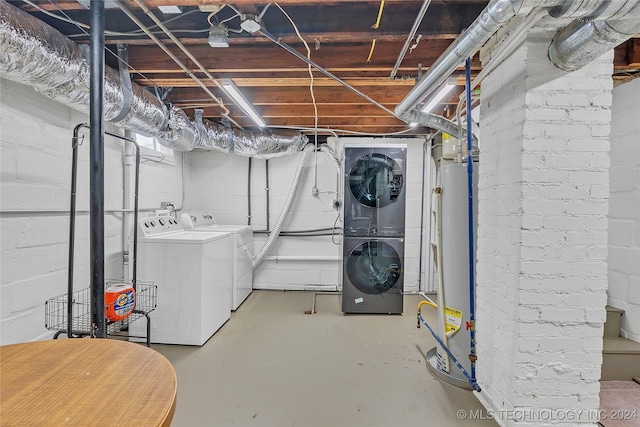 basement with washing machine and dryer and gas water heater