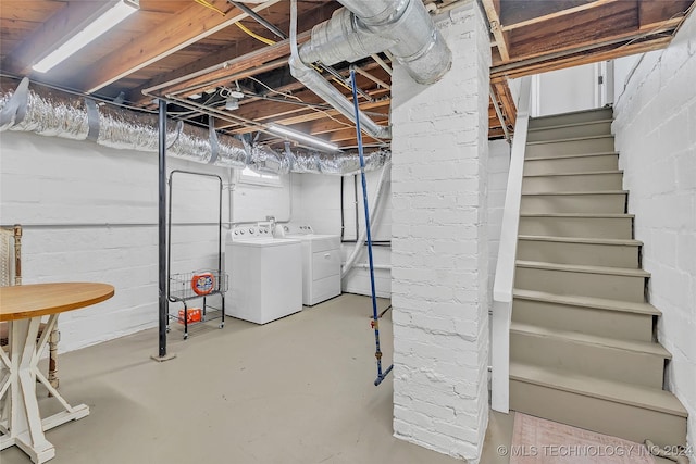 basement featuring separate washer and dryer