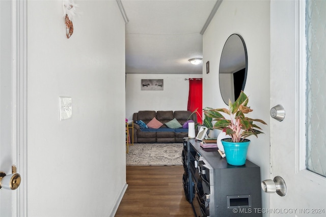 hall with dark hardwood / wood-style floors