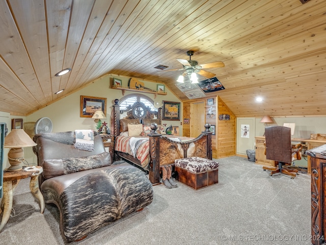 bedroom with carpet, ceiling fan, wood ceiling, and vaulted ceiling