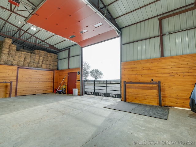 garage with wood walls